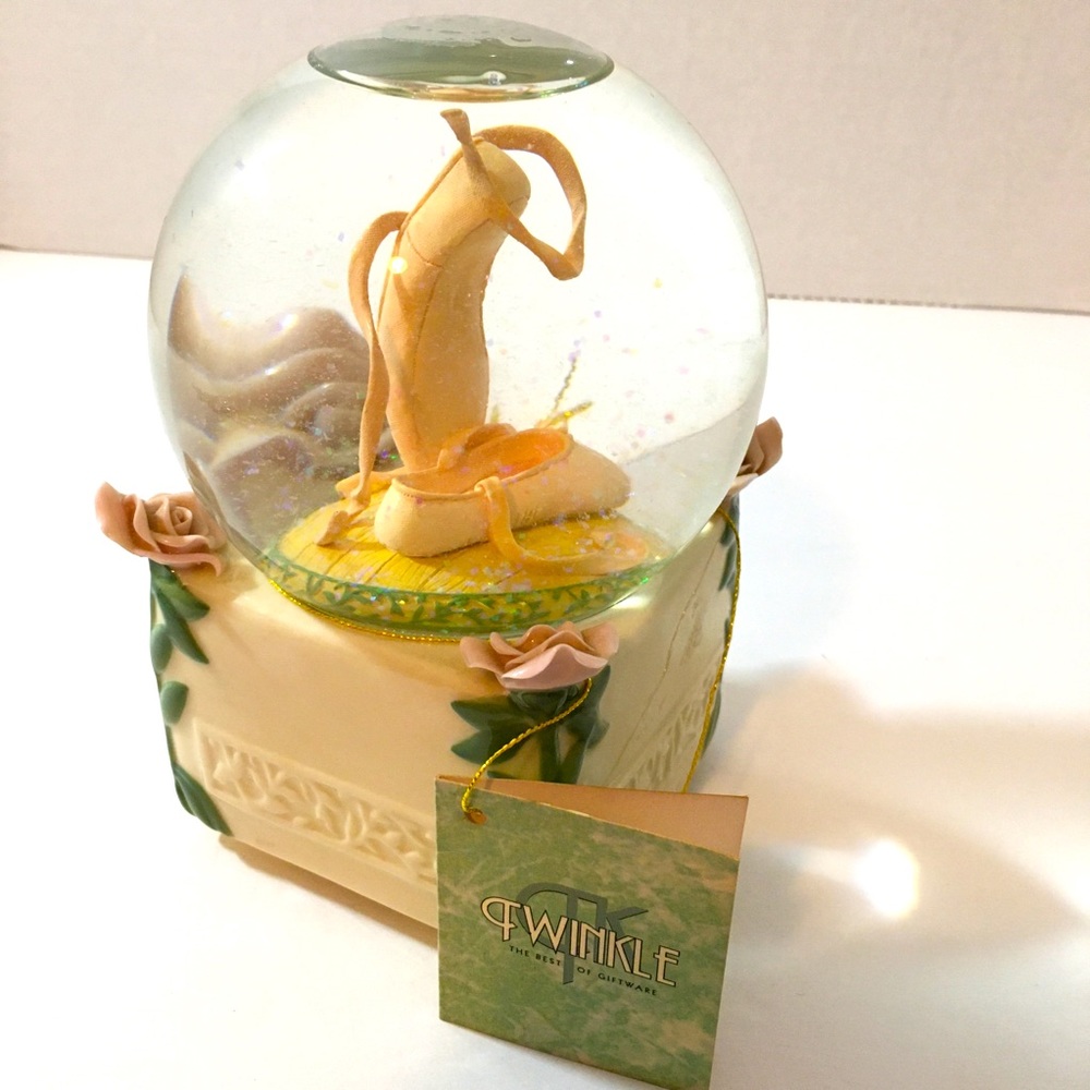 The sleeping beauty musical snow globe. Like new